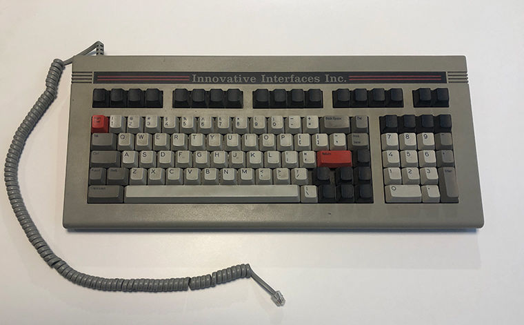 Computer keyboard, with a label reading 'Innovative Interfaces at the top'